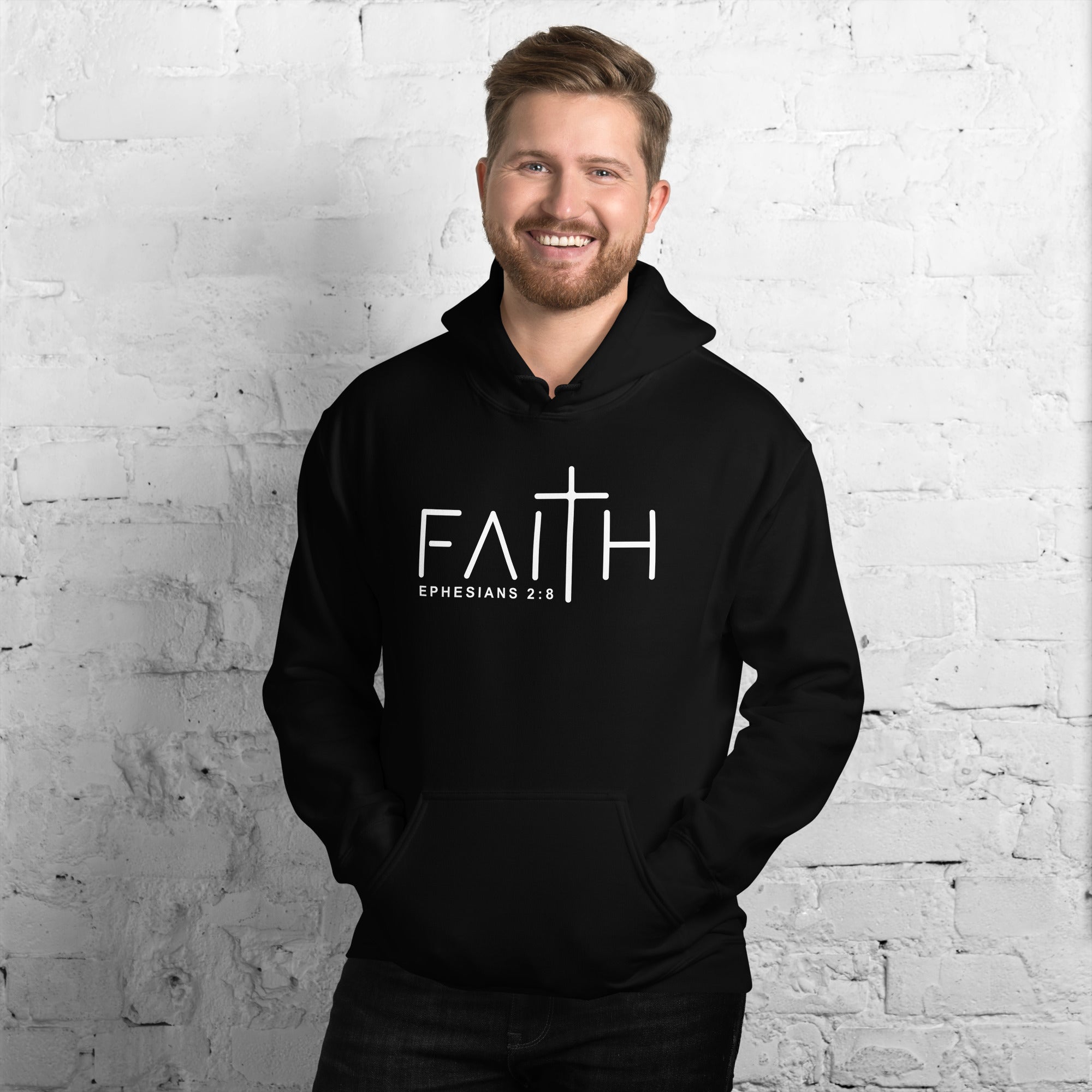 Male model in black Faith Ephesians 2:8 hoodie – stylish Christian apparel